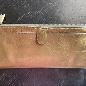 HOBO Gold Clutch with Elegant Design